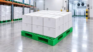 Illustrative green six-runner plastic pallet with sealed cartons in a chilled warehouse