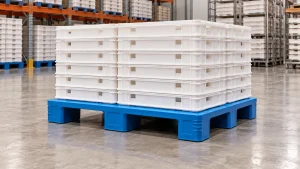 Blue flat-deck three-runner plastic pallet supporting a stable stack of plain white bakery trays
